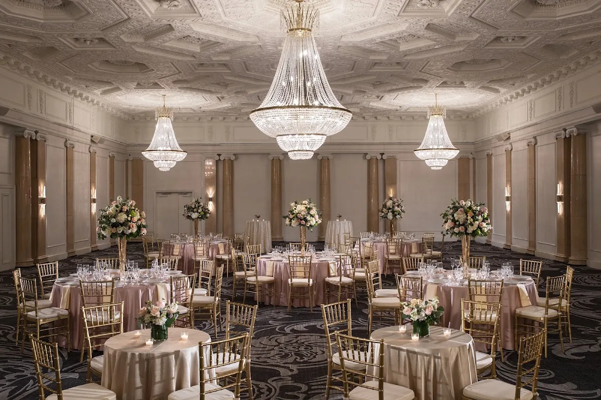 Wedding guests seated in a banquet-style venue